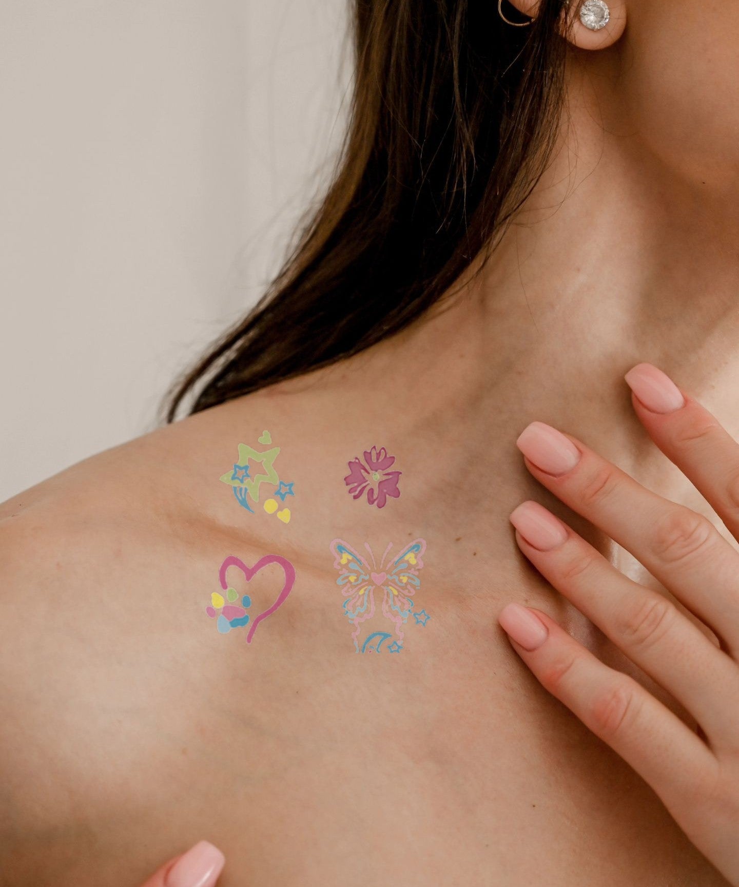 Flower Heart Love hand-drawn temporary tattoo — botanical line work, suited for below collarbone placement. Waterproof, plant-based, 3–7 day wear. By LastingDays indie artist collective.