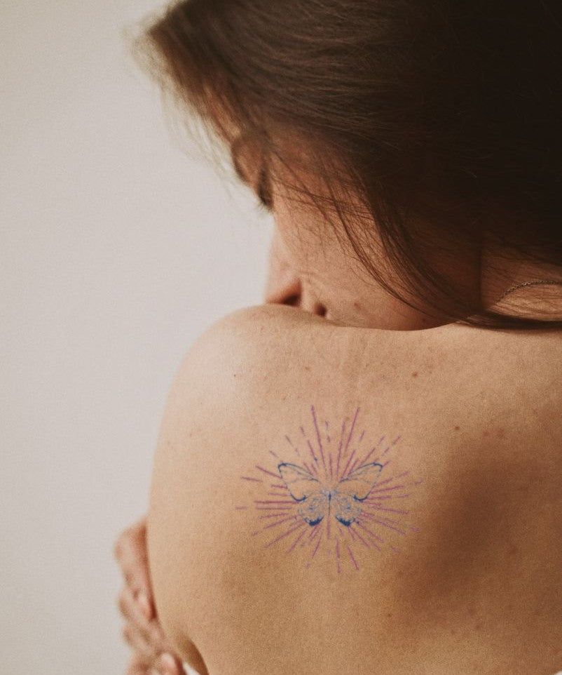Pink Starburst Mandala hand-drawn temporary tattoo — celestial design, suited for collarbone placement. Waterproof, plant-based, 3–7 day wear. By LastingDays indie artist collective.