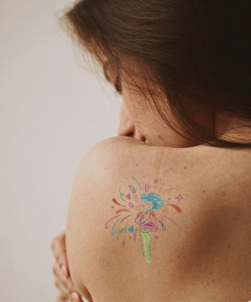 Colorful Wildflower Bouquet hand-drawn temporary tattoo — botanical line work, suited for below collarbone placement. Waterproof, plant-based, 3–7 day wear. By LastingDays indie artist collective.