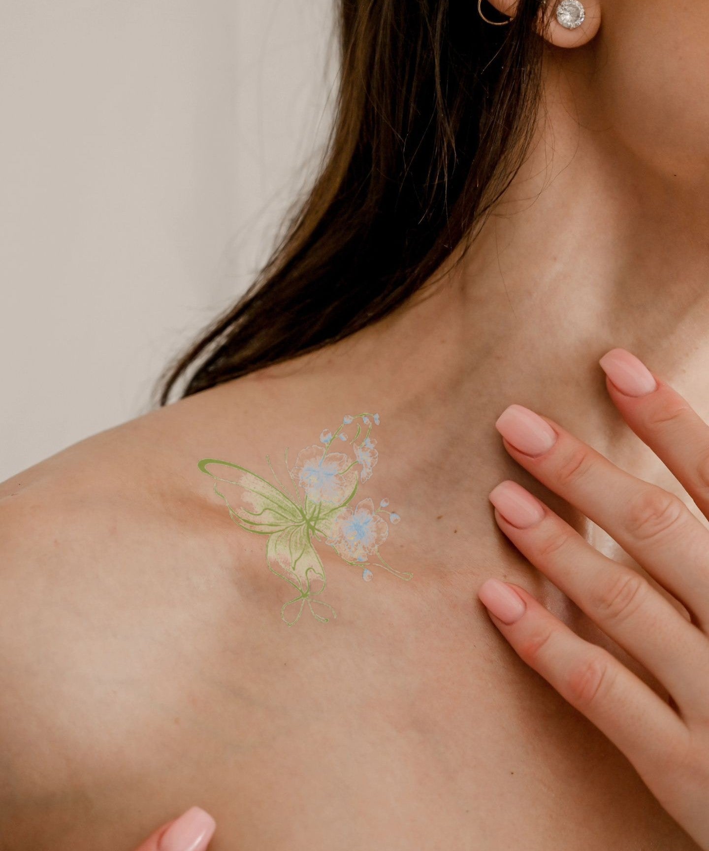 Green Garden Butterfly hand-drawn temporary tattoo — wing motif, suited for shoulder placement. Waterproof, plant-based, 3–7 day wear. By LastingDays indie artist collective.