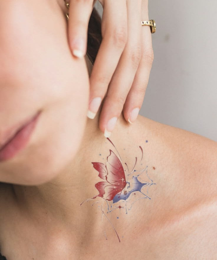 Red Butterfly Abstract hand-drawn temporary tattoo — wing motif, suited for shoulder placement. Waterproof, plant-based, 3–7 day wear. By LastingDays indie artist collective.