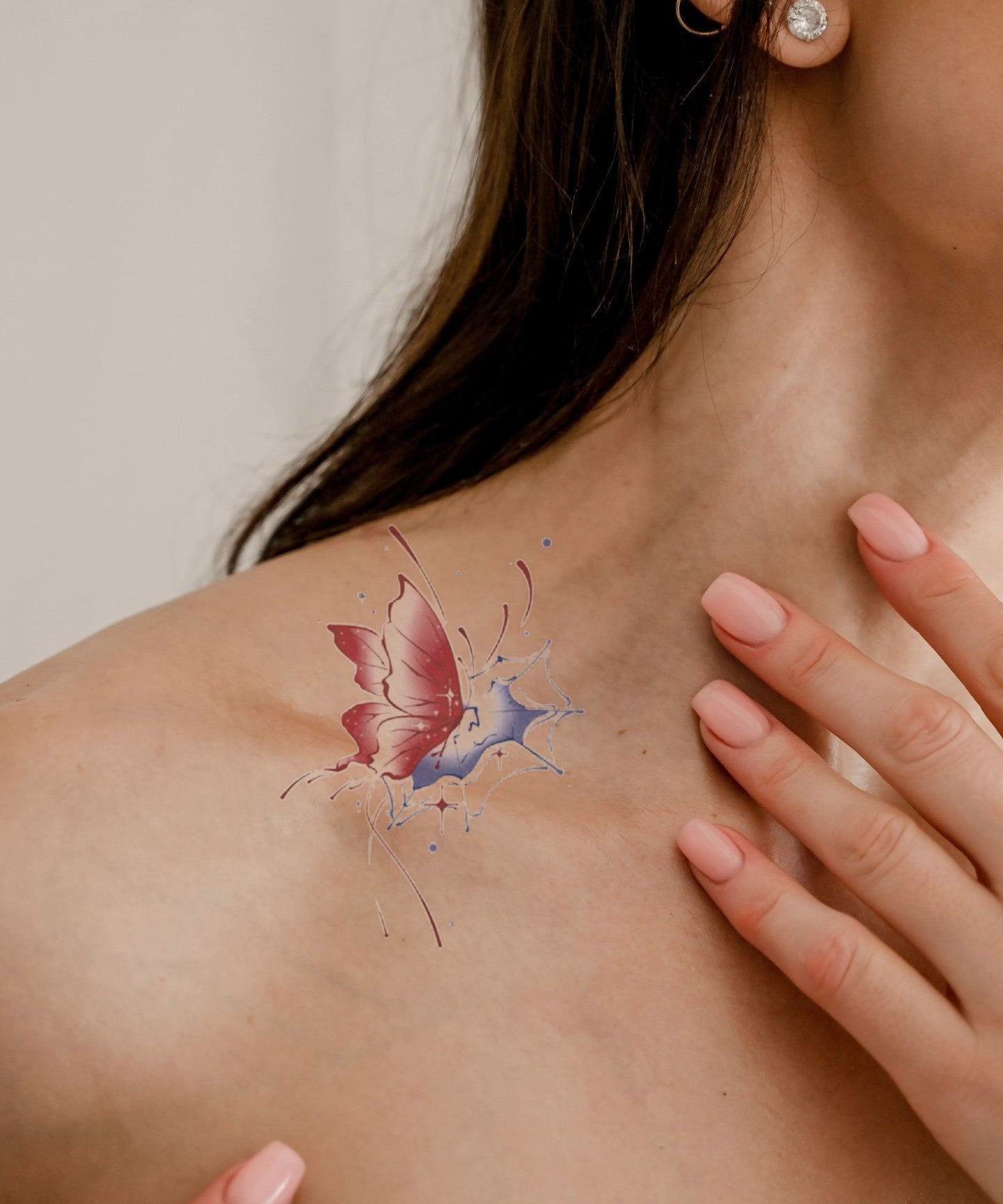 Red Butterfly Abstract hand-drawn temporary tattoo — wing motif, suited for shoulder placement. Waterproof, plant-based, 3–7 day wear. By LastingDays indie artist collective.