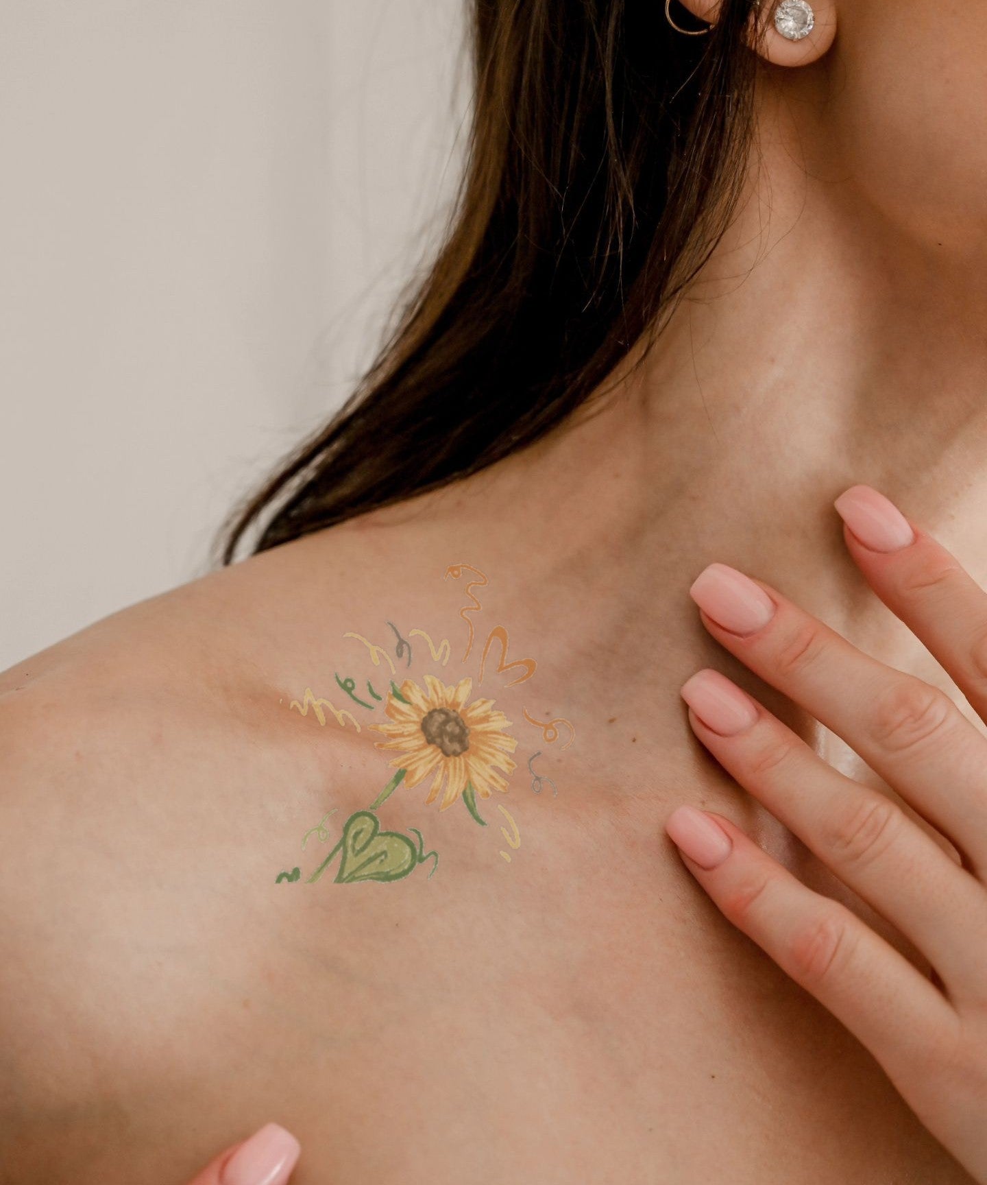 Sunflower Joy hand-drawn temporary tattoo — botanical line work, suited for below collarbone placement. Waterproof, plant-based, 3–7 day wear. By LastingDays indie artist collective.
