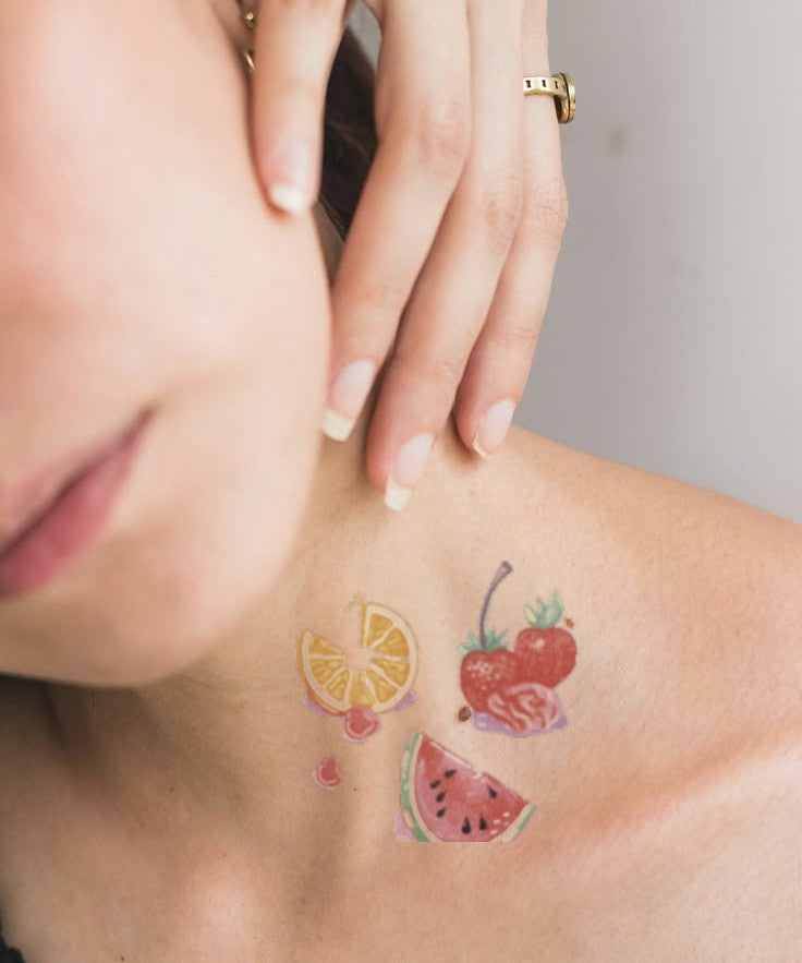 Tropical Fruit Basket hand-drawn temporary tattoo — hand-drawn original design, suited for forearm placement. Waterproof, plant-based, 3–7 day wear. By LastingDays indie artist collective.