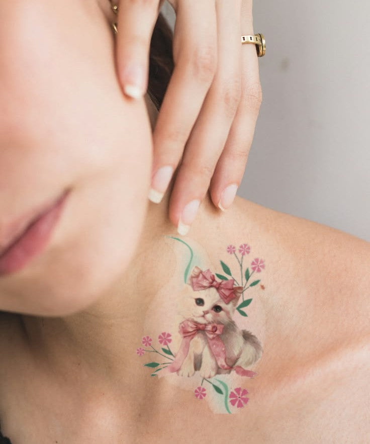 Cherry Blossom Kitten hand-drawn temporary tattoo — botanical line work, suited for forearm placement. Waterproof, plant-based, 3–7 day wear. By LastingDays indie artist collective.