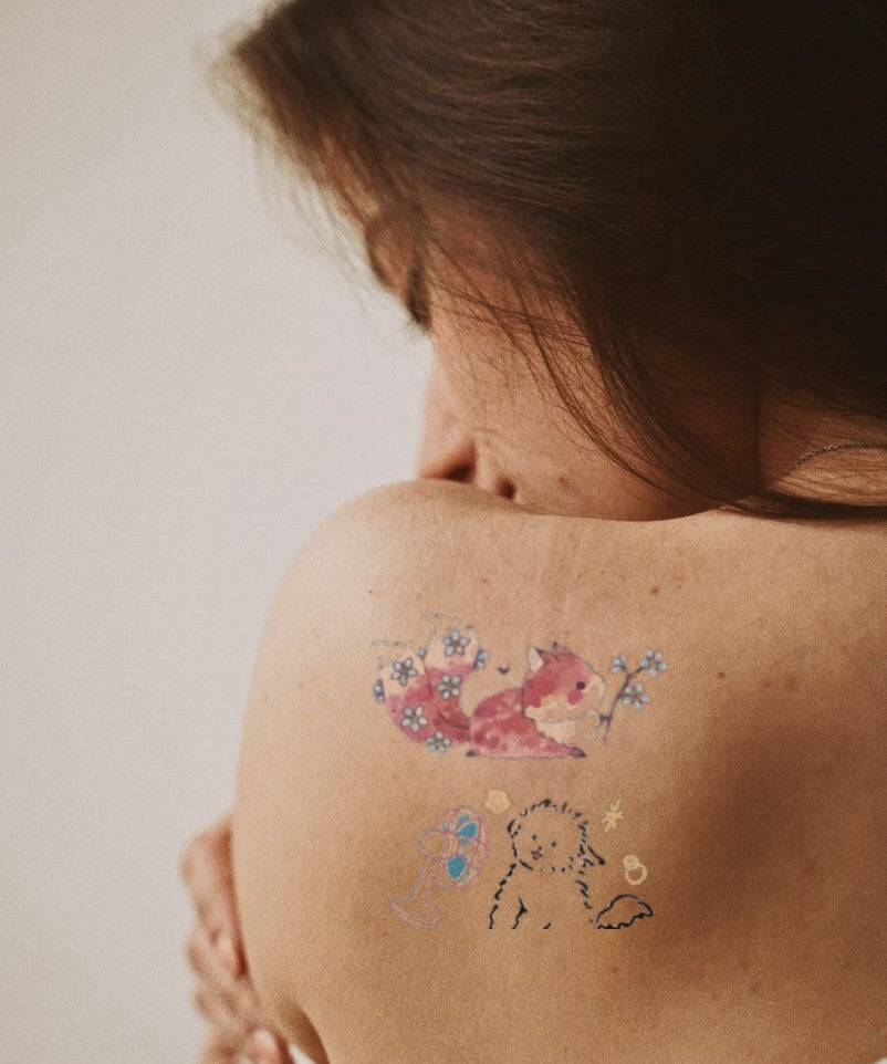 Splatter Butterfly Art hand-drawn temporary tattoo — wing motif, suited for shoulder placement. Waterproof, plant-based, 3–7 day wear. By LastingDays indie artist collective.