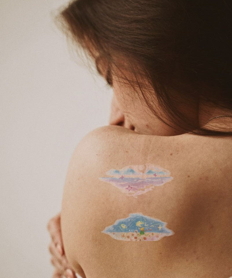 Dreamy Cloudscape hand-drawn temporary tattoo — marine illustration, suited for forearm placement. Waterproof, plant-based, 3–7 day wear. By LastingDays indie artist collective.