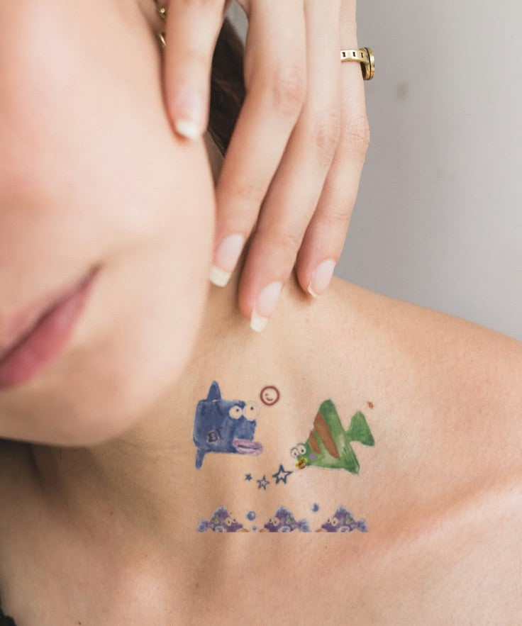 Whale & Mountain Dream hand-drawn temporary tattoo — marine illustration, suited for forearm placement. Waterproof, plant-based, 3–7 day wear. By LastingDays indie artist collective.