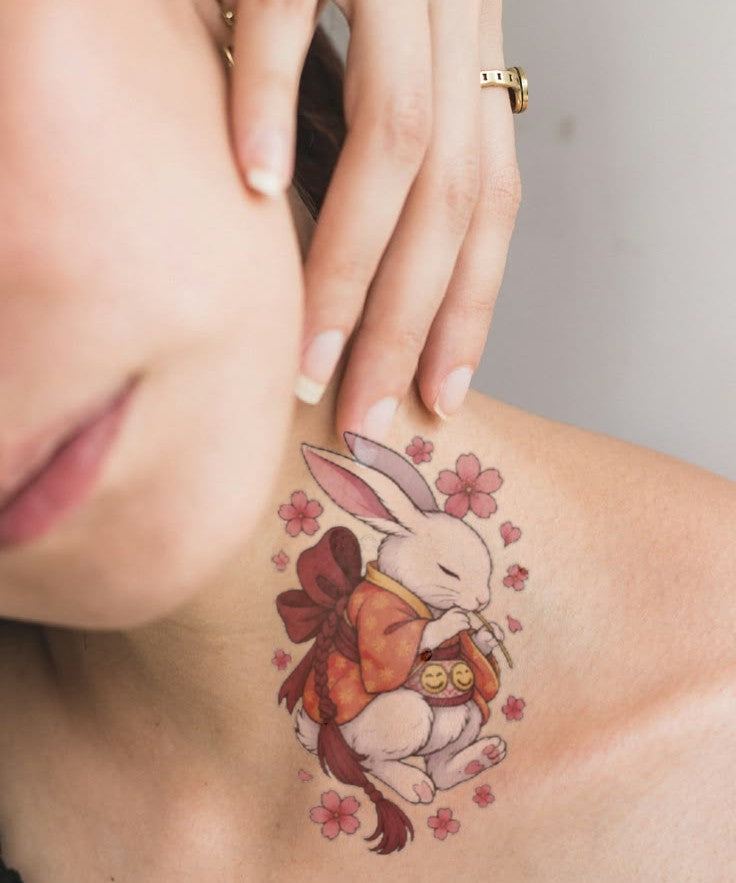 Sakura Moon Rabbit hand-drawn temporary tattoo — botanical line work, suited for forearm placement. Waterproof, plant-based, 3–7 day wear. By LastingDays indie artist collective.