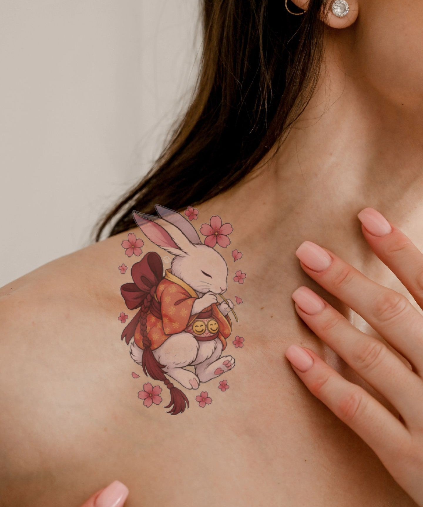 Sakura Moon Rabbit hand-drawn temporary tattoo — botanical line work, suited for forearm placement. Waterproof, plant-based, 3–7 day wear. By LastingDays indie artist collective.