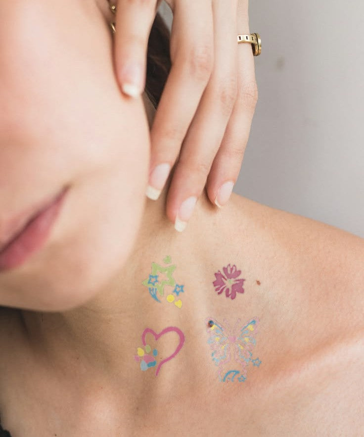 Flower Heart Love hand-drawn temporary tattoo — botanical line work, suited for below collarbone placement. Waterproof, plant-based, 3–7 day wear. By LastingDays indie artist collective.
